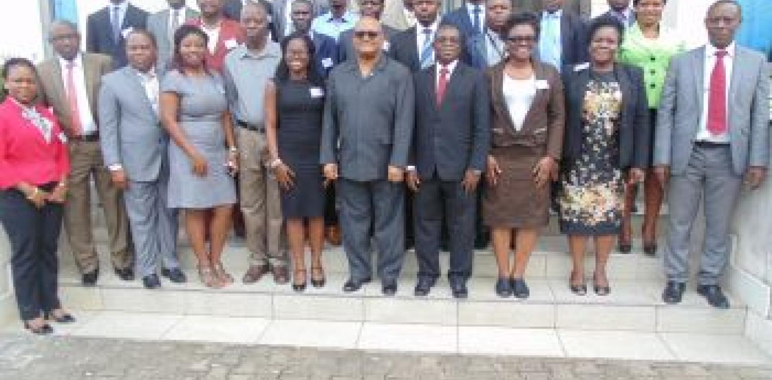 Gov. Weeks (middle) in photo with participants