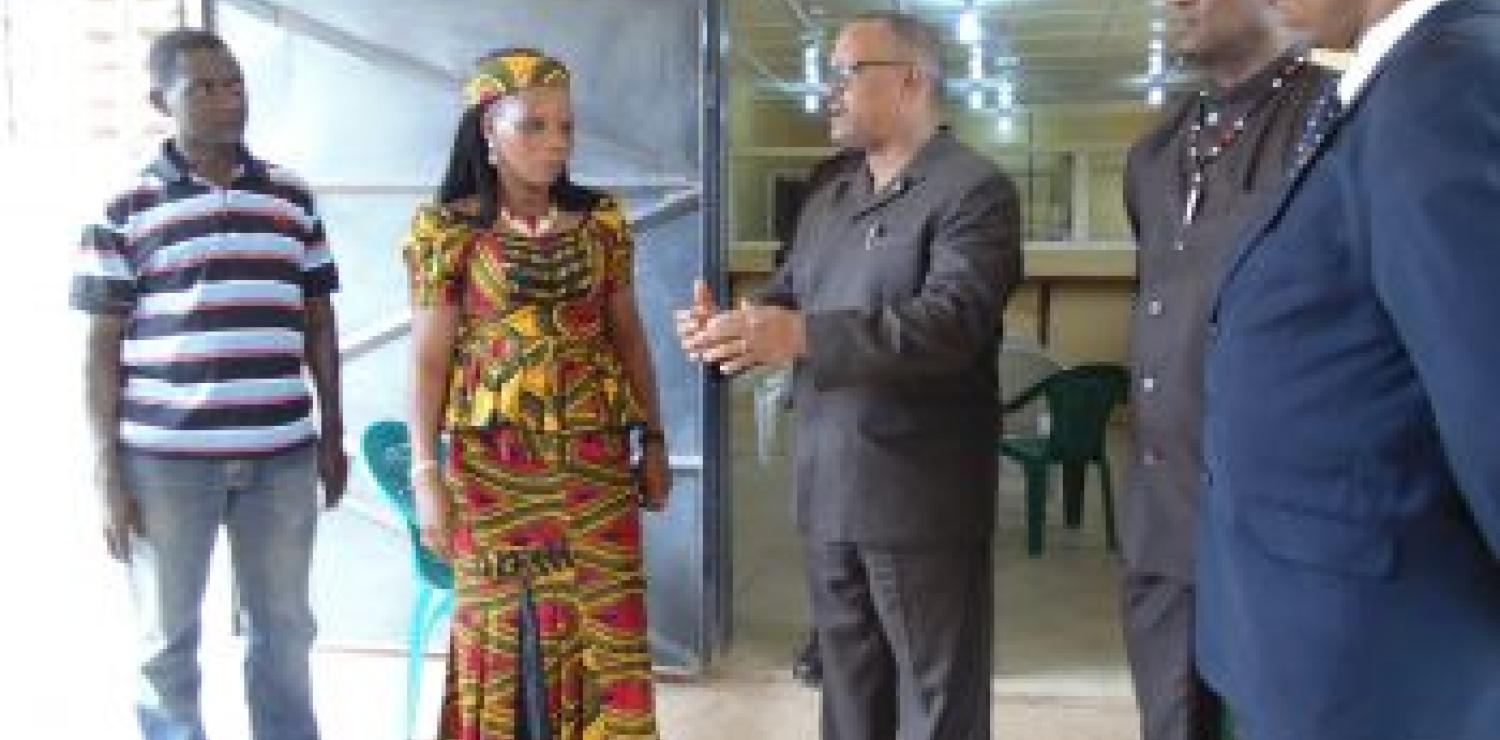 Gov. Weeks making a point during visit to CBL Payment Center in Voinjama