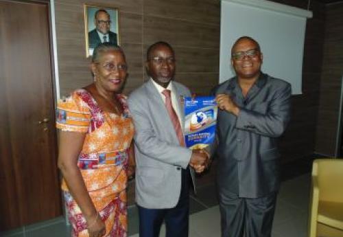 CBL Gov. Weeks receiving a Banner from Visiting Rotary International Executive