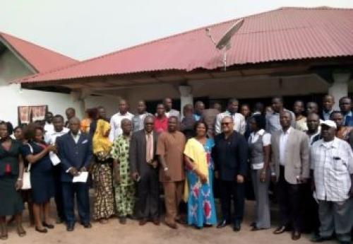 CBL Executive Governor Milton A. Weeks (fourth from right) flanked by managers and board members of rural community finance institutions